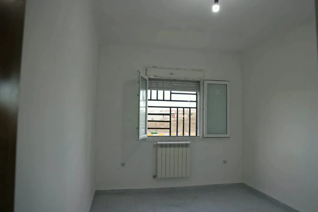 وزير السكن يعلن إدراج التدفئة المركزية في البرامج السكنية الجديدة